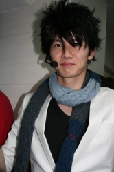 Bao Chunlai sings for an event.