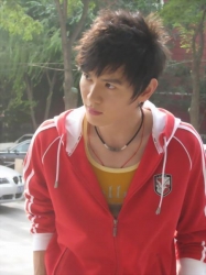 Handsome Bao Chunlai in red jacket.