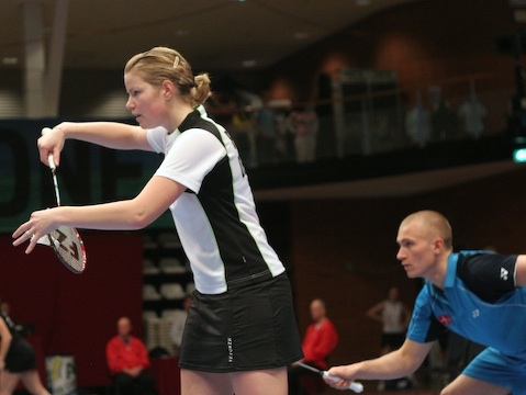 Christinna Pedersen serving with partner Rasmus Bonde-Nissen in a mixed-doubles match.