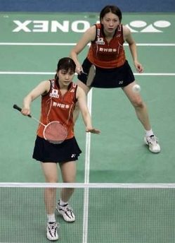 Reiko Shiota in a badminton doubles match.